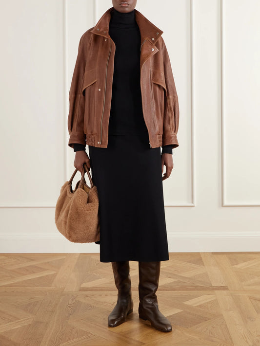 Image of a model wearing Outerwear. Product name - Cono Wool-jersey Turtleneck Top in Black colour by brand - Max Mara