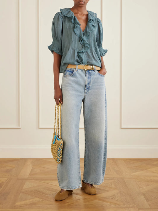 Image of a model wearing Tops. Product name - Henri Lace-trimmed Organic Cotton Blouse in Turquoise colour by brand - DÔEN