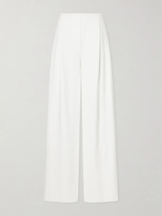 Image of a model wearing Pants. Product name - Pleated Woven Wide-leg Pants in White colour by brand - Norma Kamali