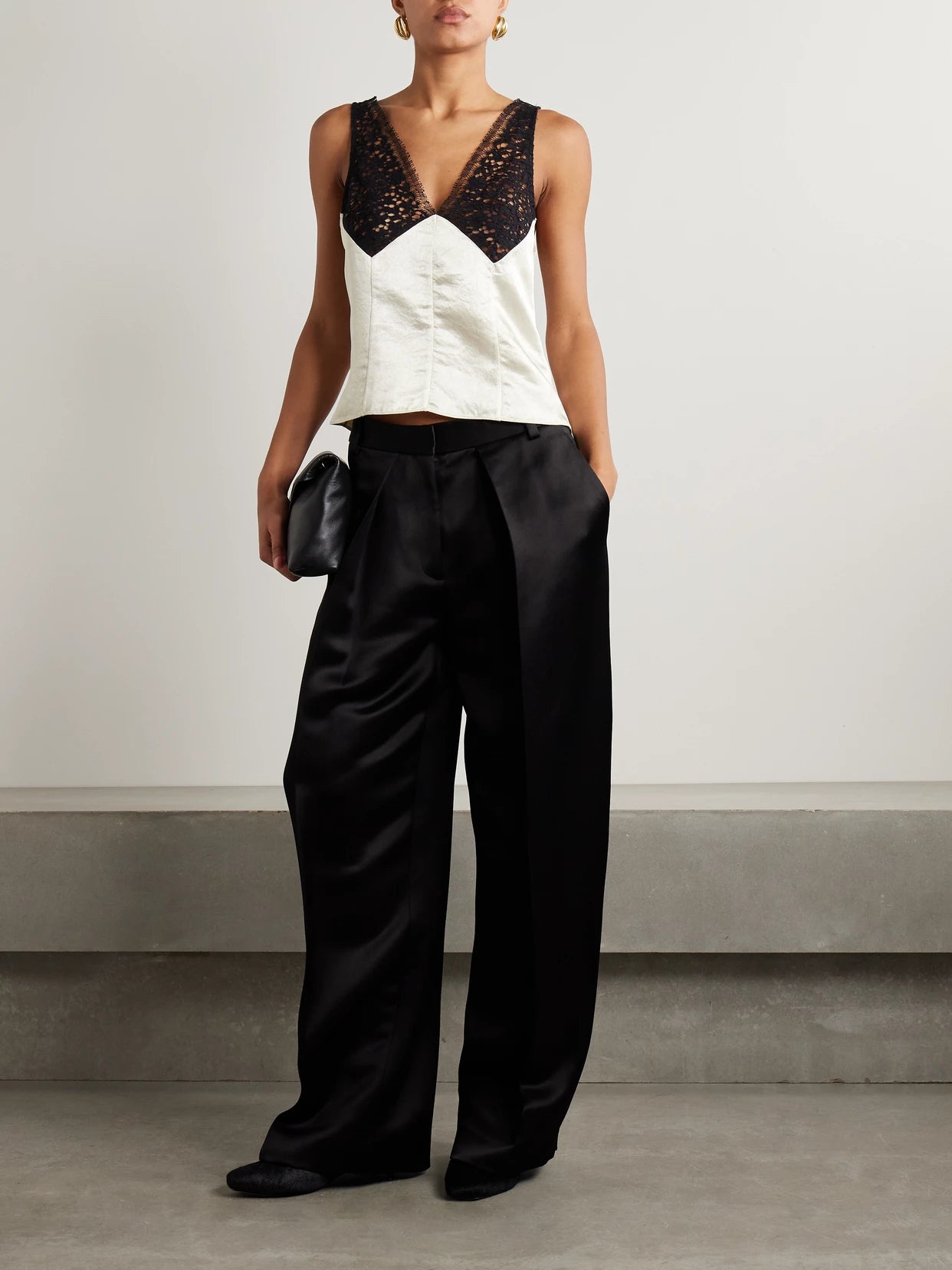 Image of a model wearing Tops. Product name - Satin-twill And Corded Lace Camisole in Cream colour by brand - Maria McManus