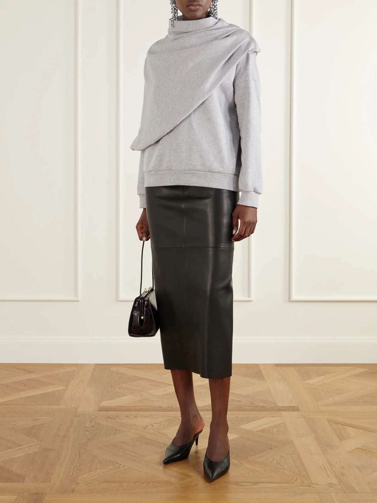 Image of a model wearing Tops. Product name - Cape-effect Draped Cotton-blend Jersey Sweatshirt in Gray colour by brand - Magda Butrym