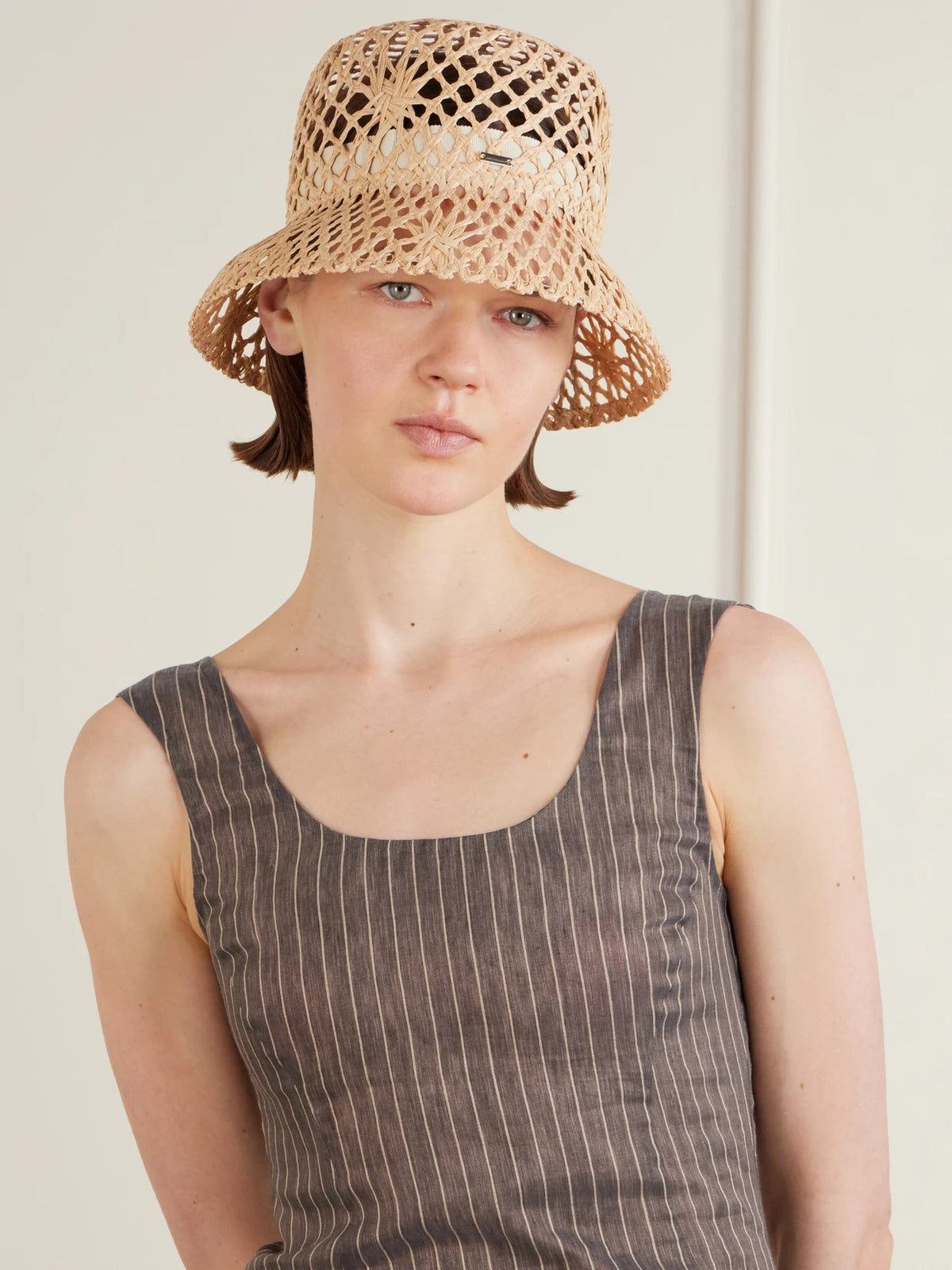 Image of Hats. Product name - Jonah Raffia Bucket Hat in Neutral colour by brand - Eugenia Kim