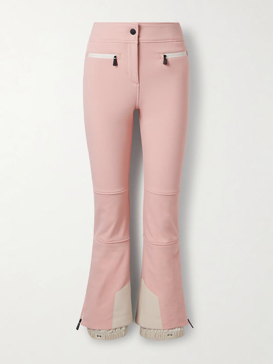 Image of a model wearing Pants. Product name - Paneled Bootcut Ski Pants in Baby pink colour by brand - Moncler Grenoble