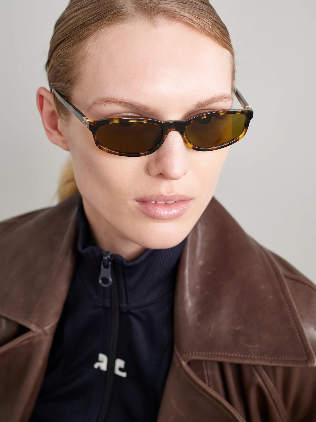 Image of Sunglasses. Product name - Oval-frame Tortoiseshell Acetate Sunglasses in Multi colour by brand - Miu Miu Eyewear