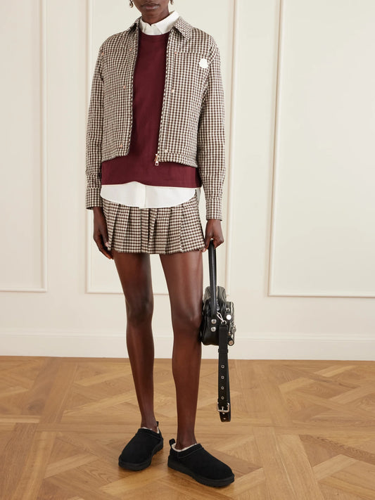Image of a model wearing Tops. Product name - Logo-appliquéd Cotton-jersey T-shirt in Burgundy colour by brand - Moncler