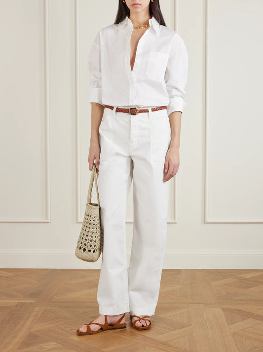 Image of a model wearing Pants. Product name - Cotton Straight-leg Pants in Off-white colour by brand - Matteau
