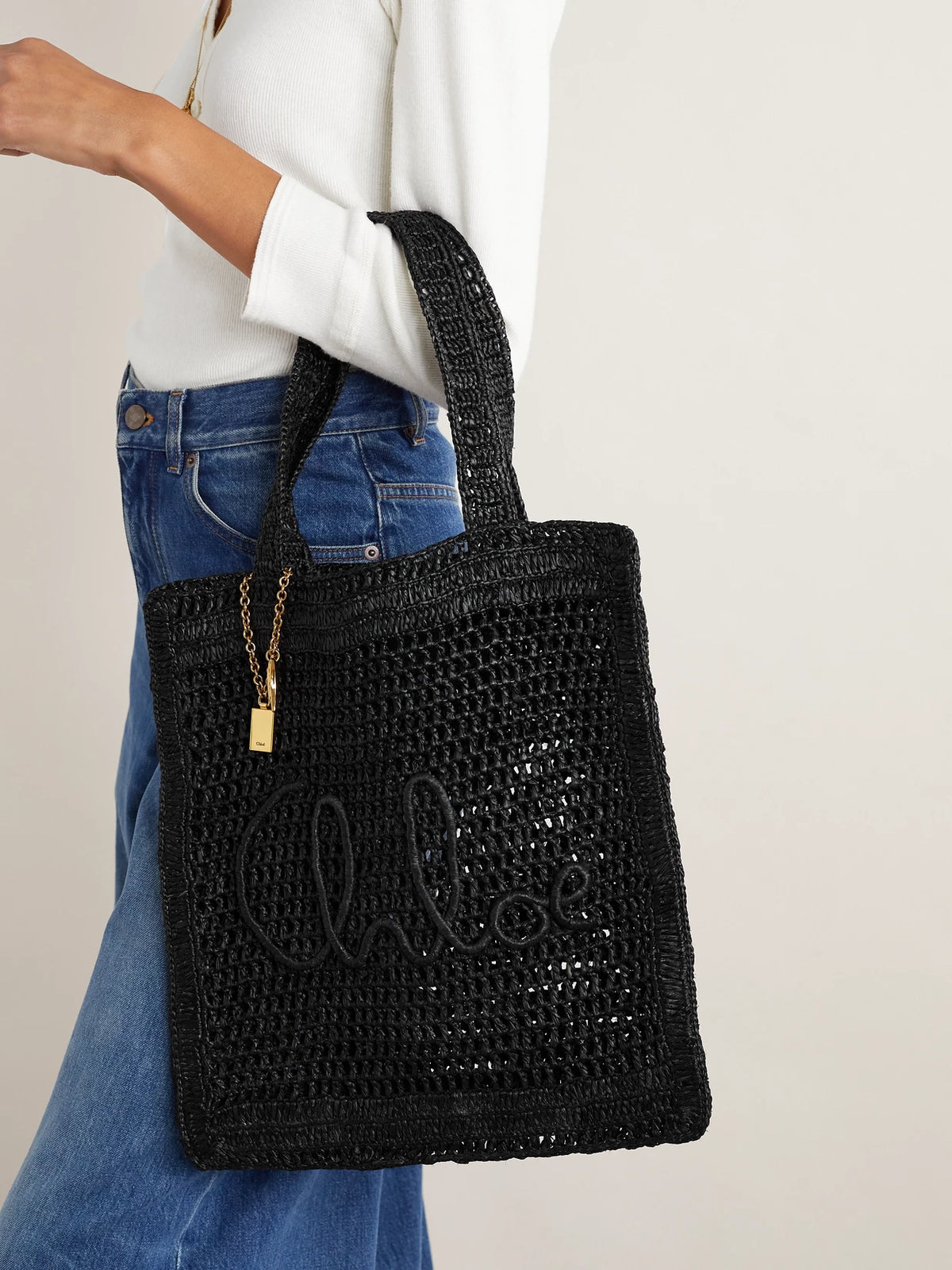 Image of Bags. Product name - Summer Banana Embellished Crocheted Embroidered Raffia-like Tote in Black colour by brand - Chloé