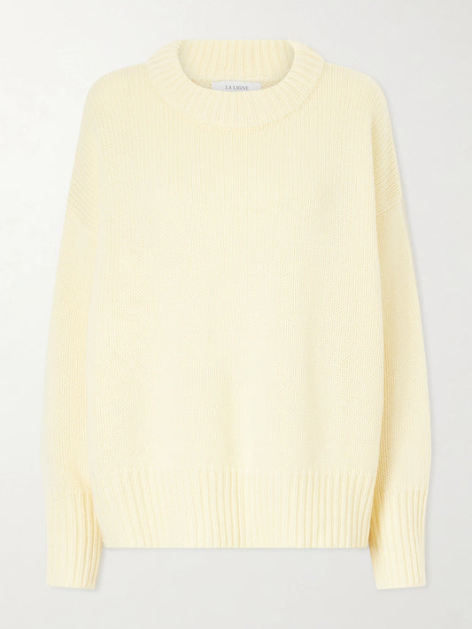 Image of a model wearing Outerwear. Product name - Marin Wool And Cashmere-blend Sweater in Pastel yellow colour by brand - La Ligne