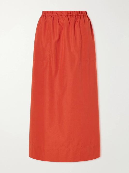 Image of a model wearing Skirts. Product name - Cotton-poplin Midi Skirt in Red colour by brand - TOTEME