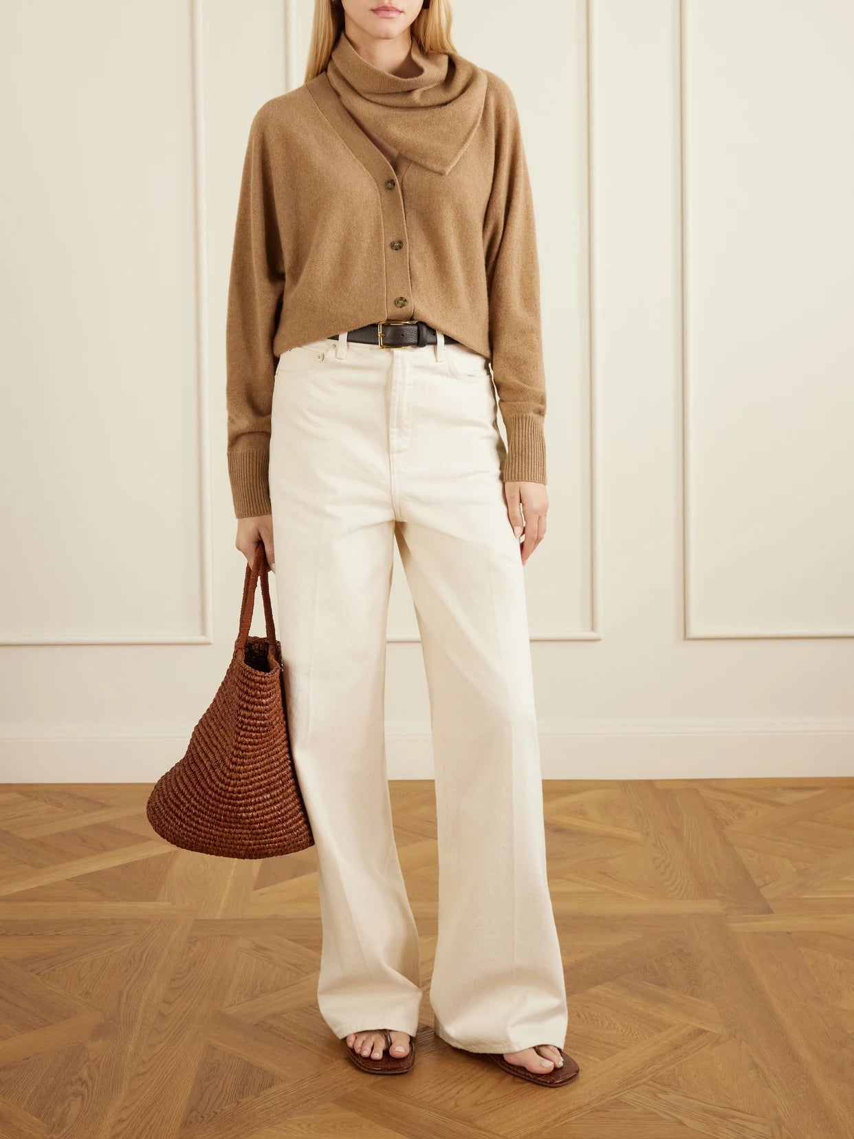 Image of a model wearing Outerwear. Product name - Lyss Organic Cashmere Cardigan in Camel colour by brand - Le Kasha