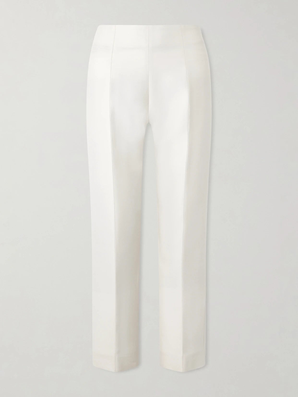 Image of a model wearing Pants. Product name - Wool And Silk-blend Straight-leg Pants in Ecru colour by brand - TOTEME