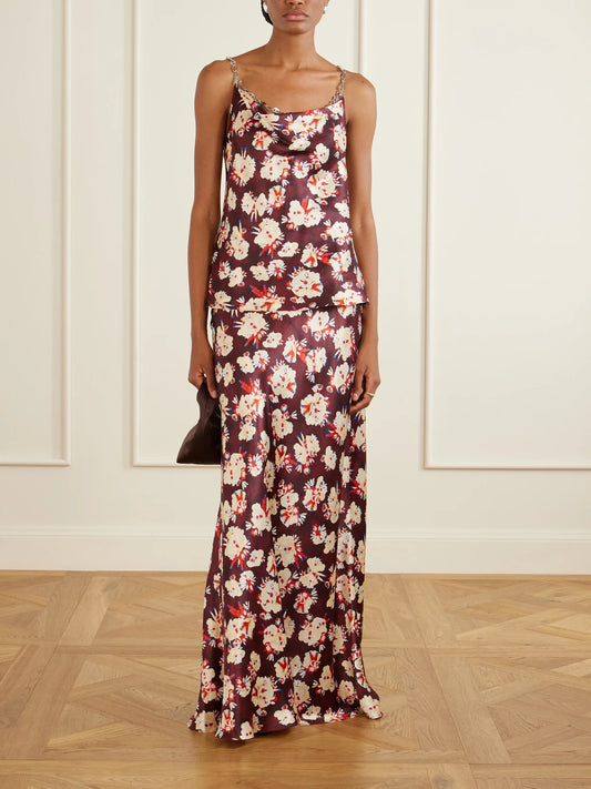 Image of a model wearing Skirts. Product name - Chainmail-embellished Floral-print Silk Maxi Skirt in Purple colour by brand - RABANNE
