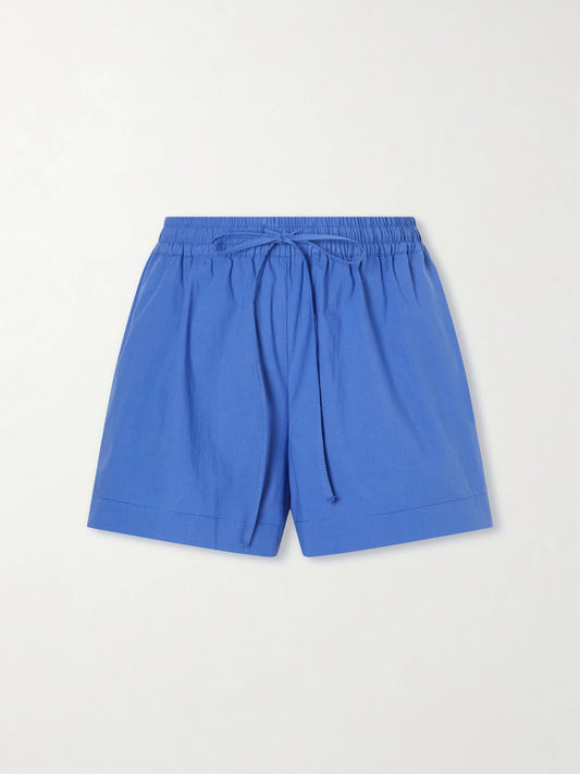 Image of a model wearing Shorts. Product name - Organic Cotton-poplin Shorts in Blue colour by brand - Matteau