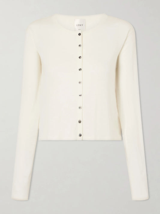 Image of a model wearing Outerwear. Product name - James Merino Wool Cardigan in White colour by brand - LESET