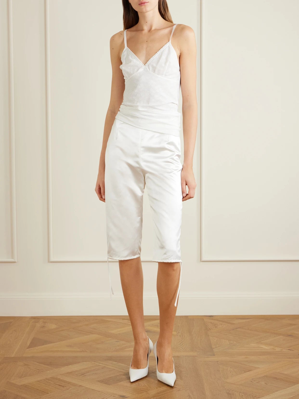 Image of a model wearing Tops. Product name - Floral Vintage Mesh Tank in White colour by brand - Colleen Allen