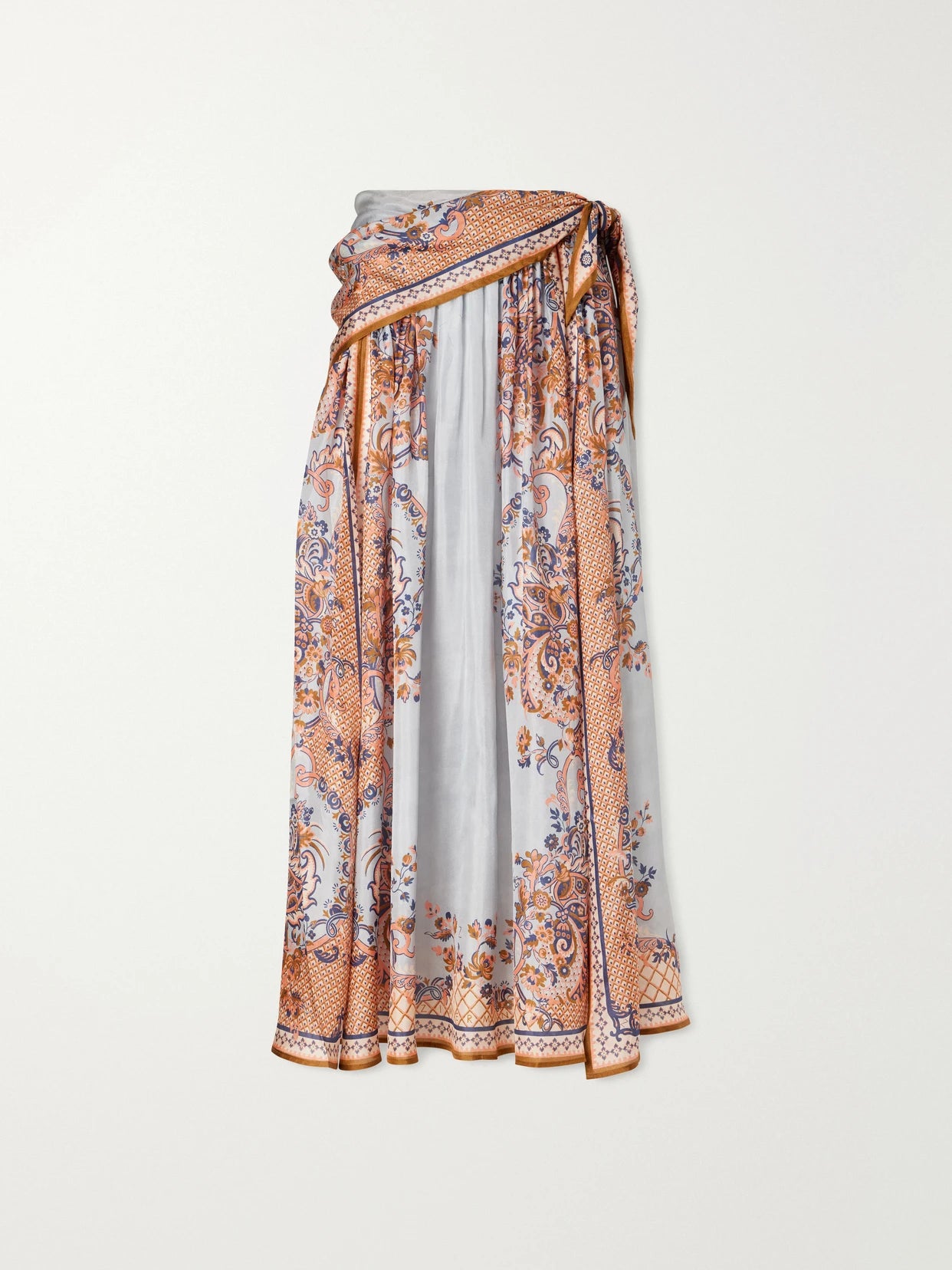 Image of a model wearing Skirts. Product name - Aster Tie-detailed Printed Silk Midi Skirt in Blue colour by brand - Zimmermann