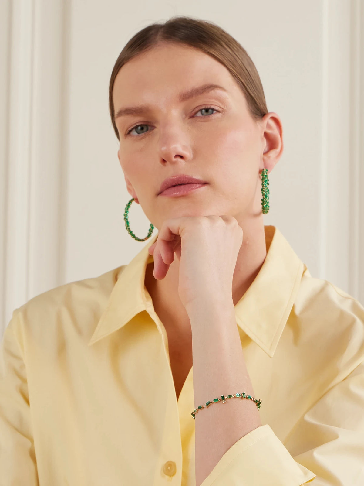 Image of Earrings. Product name - 18-karat Gold Emerald Hoop Earrings in Green colour by brand - Suzanne Kalan