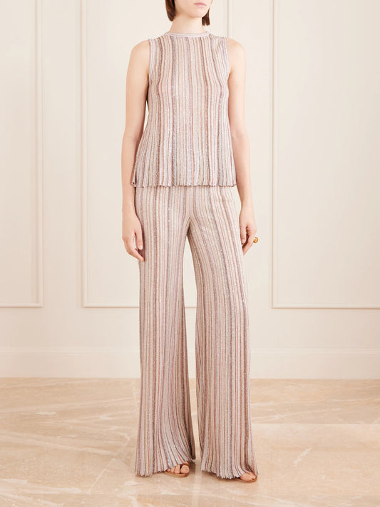 Image of a model wearing Tops. Product name - Metallic Crochet-knit Tank Top in Cream colour by brand - Missoni