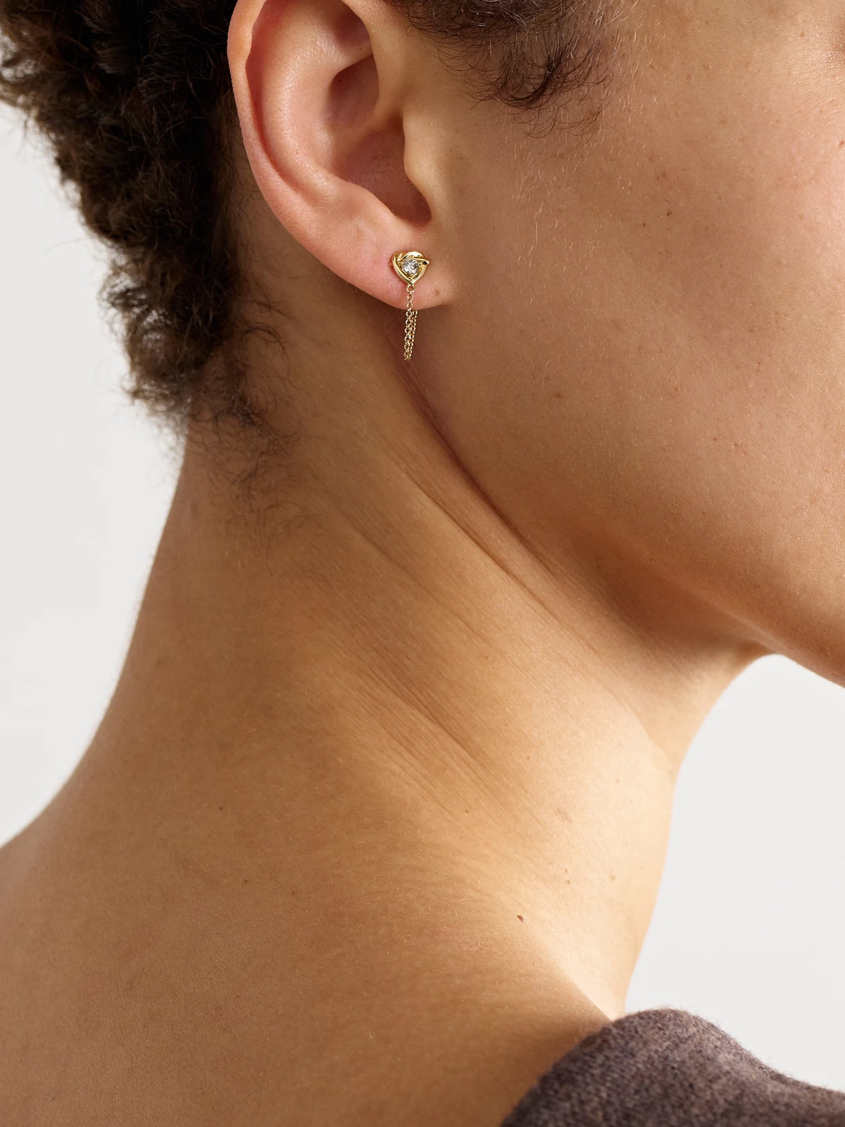 Image of Earrings. Product name - Tie The Knot 10-karat Gold Diamond Earrings in Multi colour by brand - STONE AND STRAND
