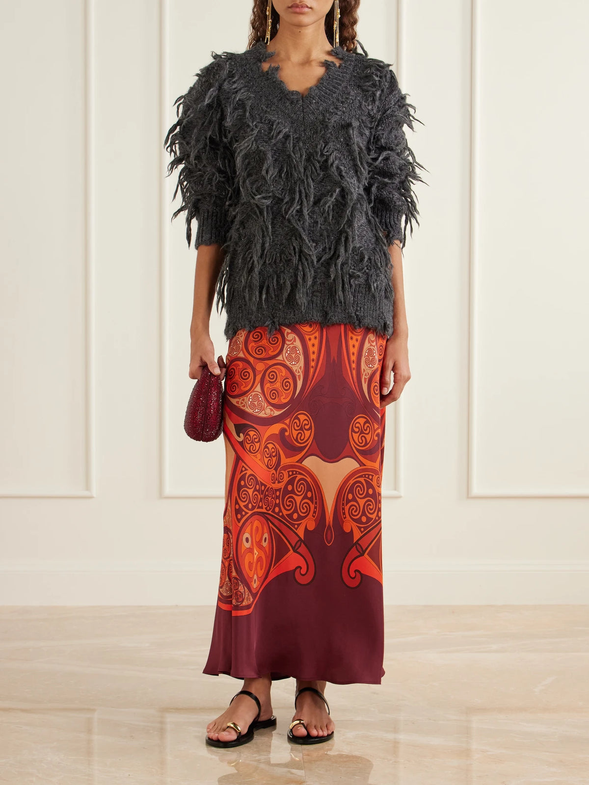 Image of a model wearing Skirts. Product name - Sleek Printed Silk-twill Maxi Skirt in Pink colour by brand - La DoubleJ