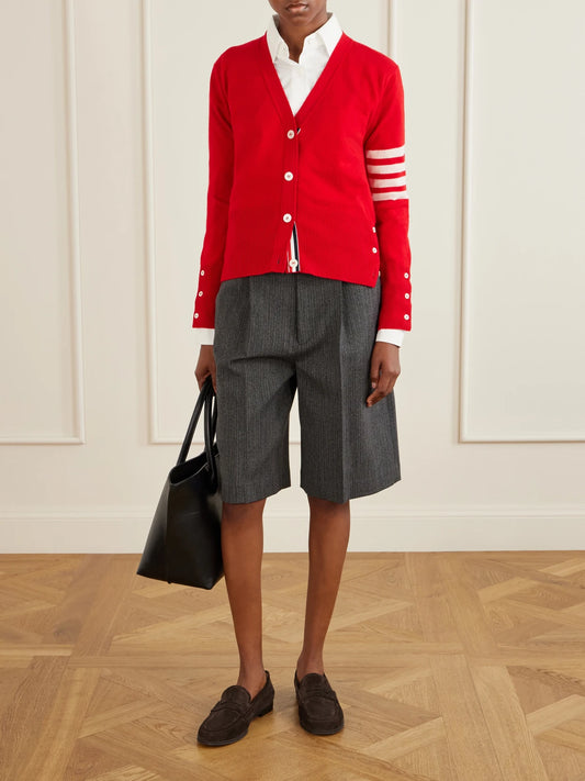 Image of a model wearing Outerwear. Product name - 4-bar Cashmere Cardigan in Red colour by brand - Thom Browne