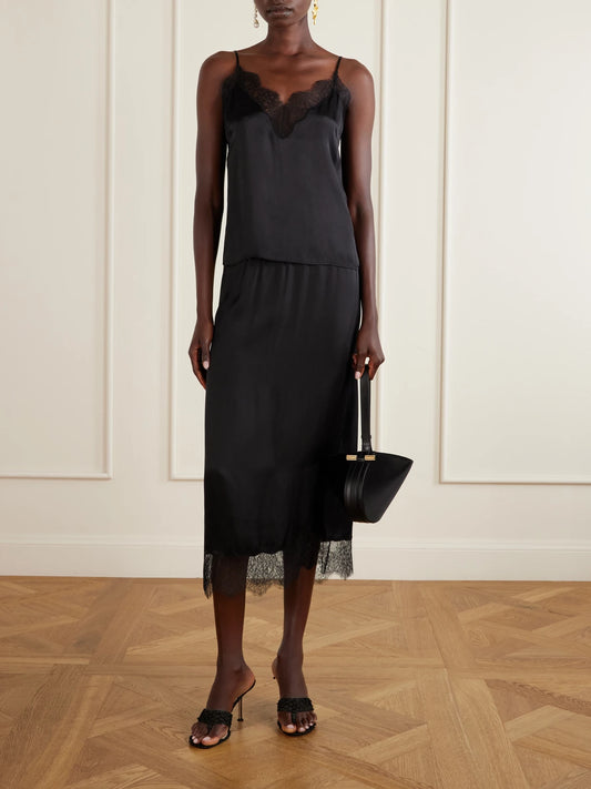 Image of a model wearing Tops. Product name - Mael Lace-trimmed Silk-blend Satin Top in Black colour by brand - Anine Bing