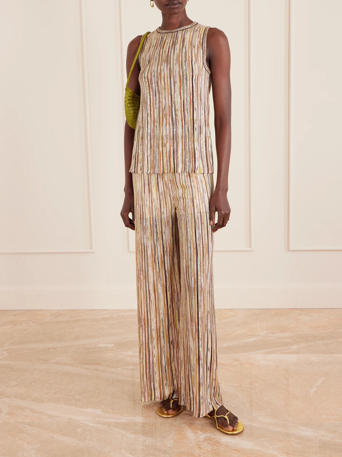 Image of a model wearing Tops. Product name - Mare Sequined Metallic Striped Crochet-knit Tank in Brown colour by brand - Missoni