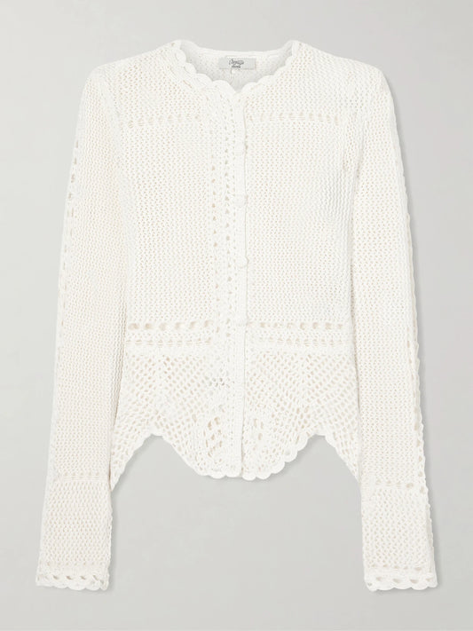 Image of a model wearing Outerwear. Product name - Crocheted Cotton Peplum Cardigan in White colour by brand - Erdem