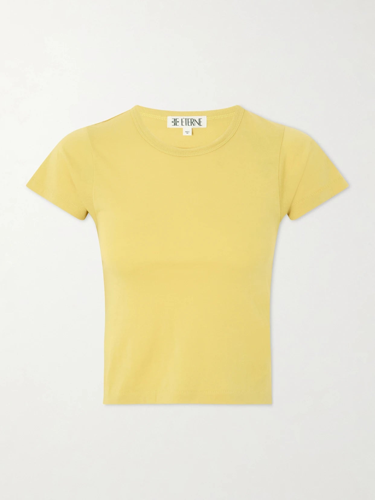 Image of a model wearing Tops. Product name - Cotton And Modal-blend T-shirt in Yellow colour by brand - ÉTERNE