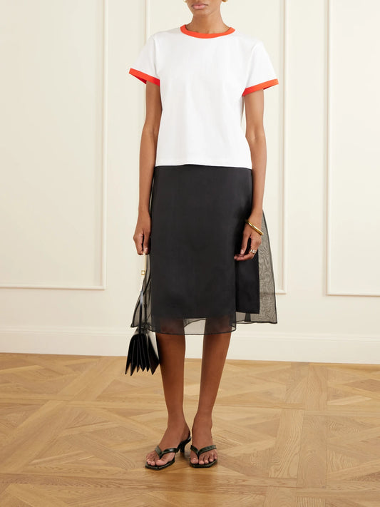 Image of a model wearing Tops. Product name - Margo Cotton-jersey T-shirt in White colour by brand - LESET