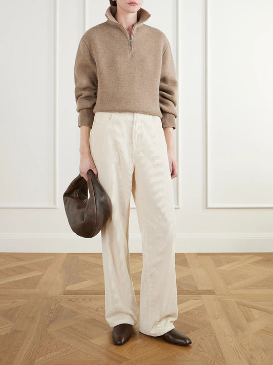 Image of a model wearing Outerwear. Product name - Dana Merino Wool And Cashmere-blend Half-zip Sweater in Camel colour by brand - Almada
