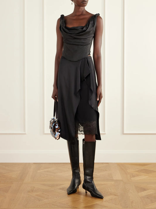 Image of a model wearing Tops. Product name - Olivia Draped Silk-dupioni Top in Black colour by brand - STAUD