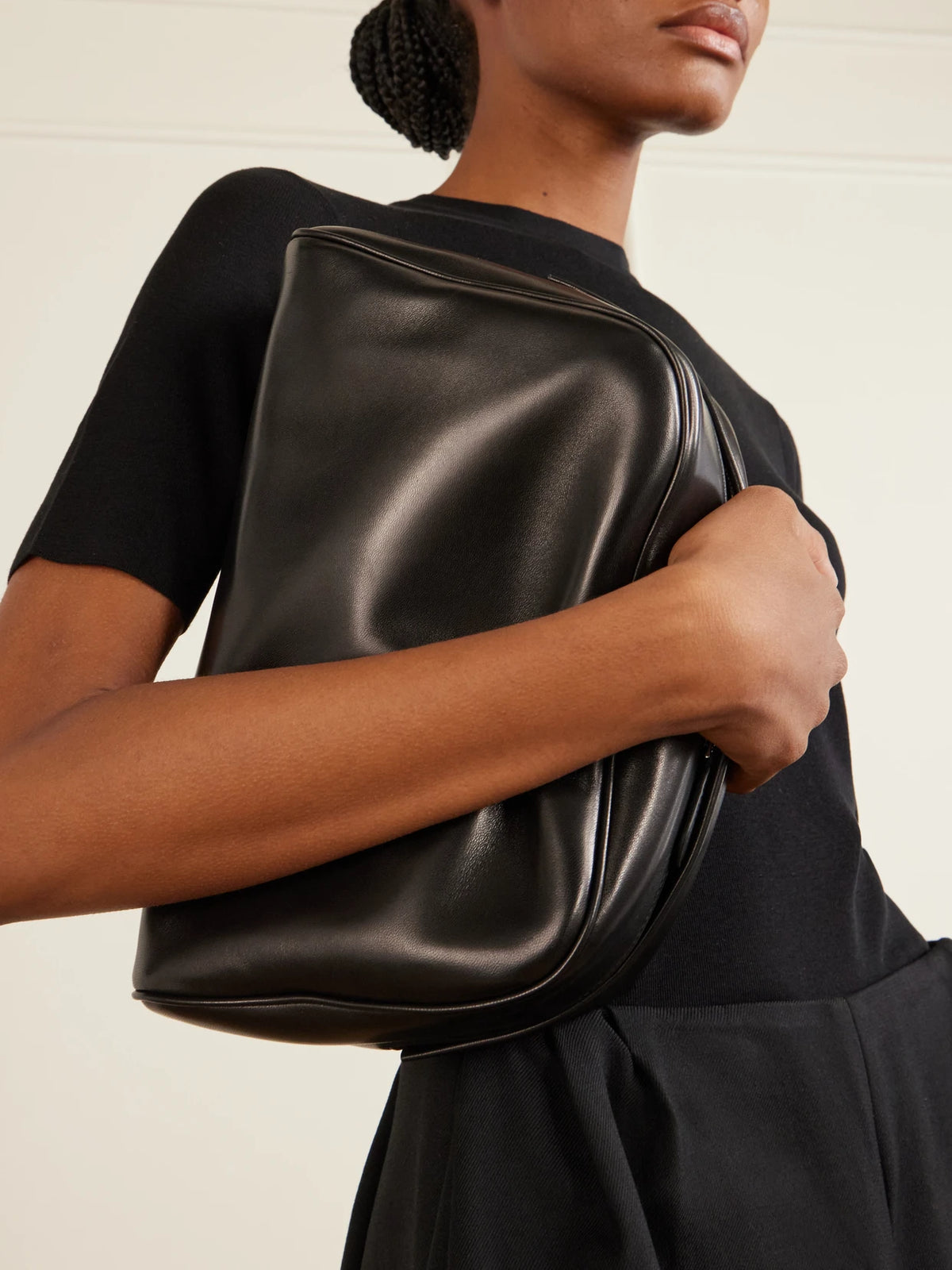 Image of Bags. Product name - Leila Leather Clutch in Black colour by brand - The Row