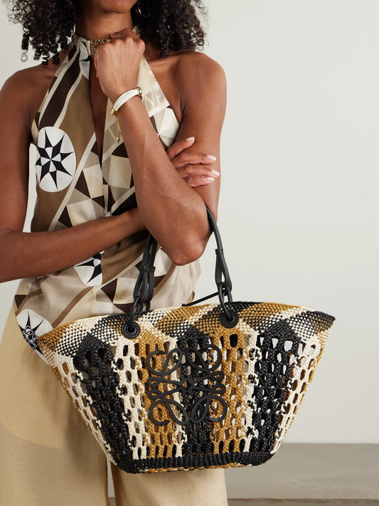 Image of Bags. Product name - + Paula's Ibiza Anagram Leather-trimmed Woven Palm Tote in Brown colour by brand - LOEWE