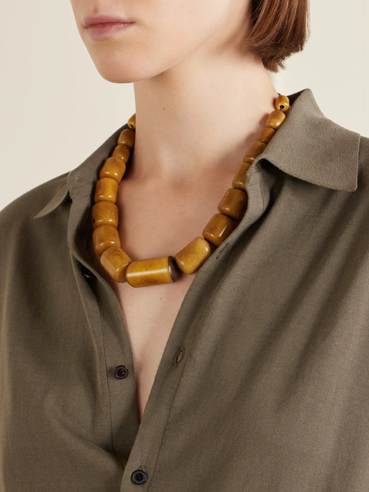 Image of Necklaces. Product name - The Column Statement Beaded Tagua And Leather Necklace in Camel colour by brand - Hunting Season