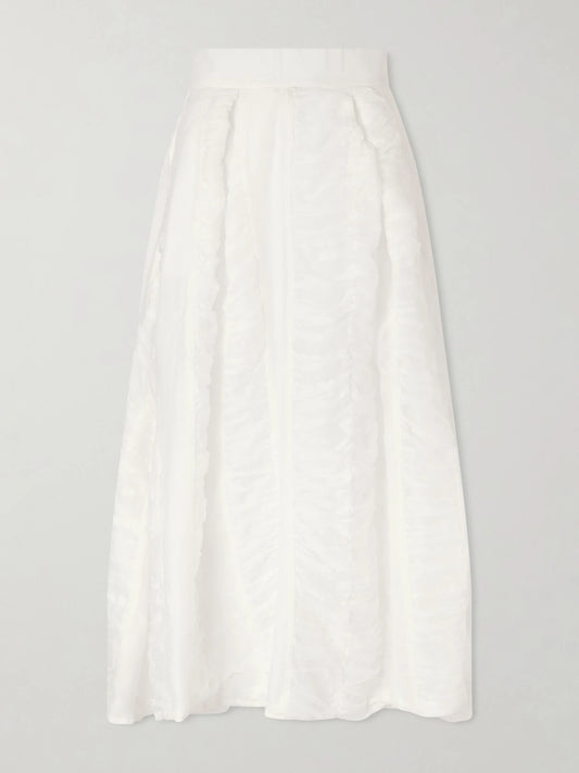 Image of a model wearing Skirts. Product name - Wynona Ruched Cotton-gauze Midi Skirt in Off-white colour by brand - Thierry Colson