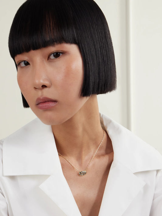 Image of Necklaces. Product name - East West 18-karat Gold Brown And White Diamond Pendant Necklace in Multi colour by brand - Lucy Delius