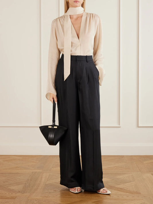 Image of a model wearing Tops. Product name - Scarf-detailed Satin Blouse in Cream colour by brand - Maria McManus