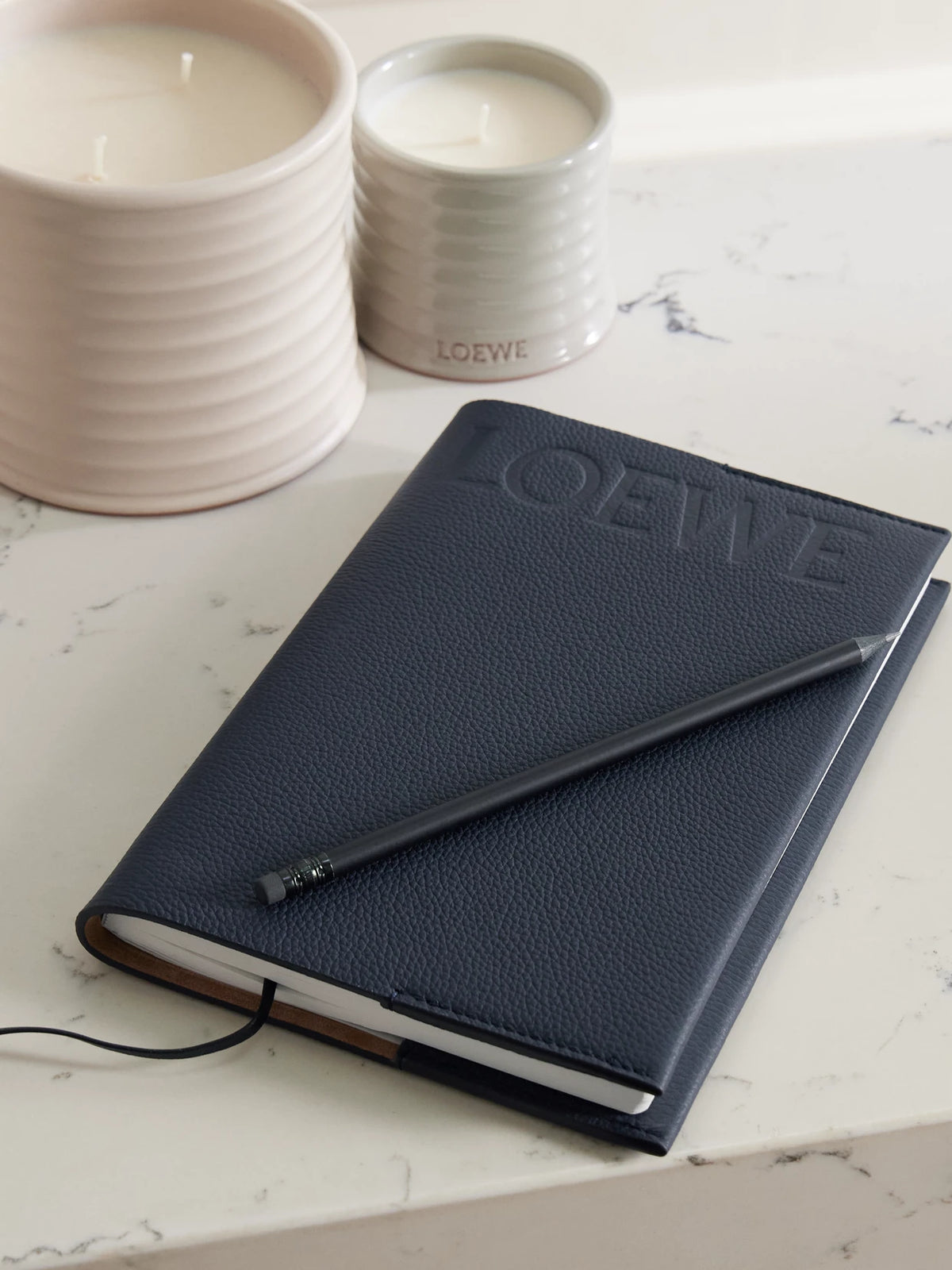 Image of Books. Product name - Logo-embossed Leather Notebook in Navy colour by brand - LOEWE