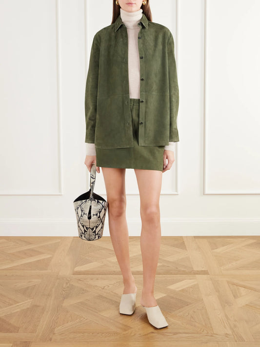 Image of a model wearing Tops. Product name - Reece Paneled Suede Shirt in Green colour by brand - Theory
