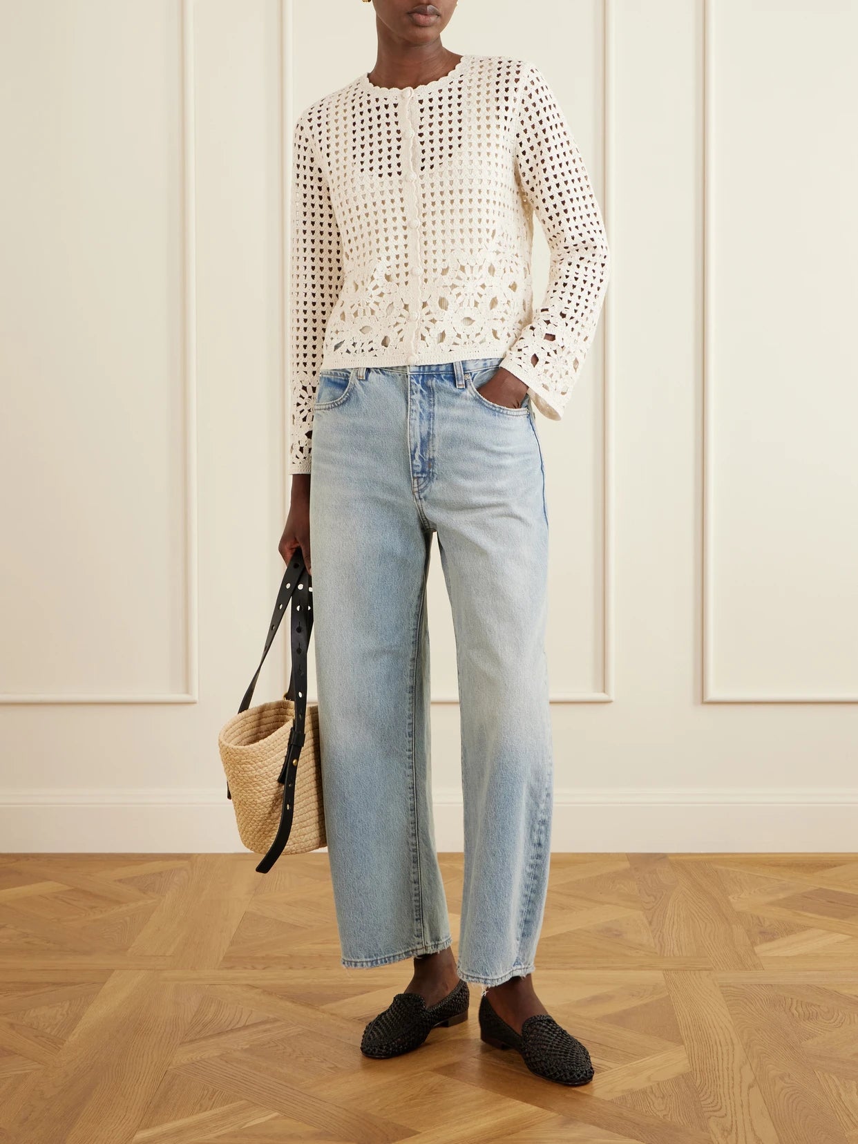 Image of a model wearing Outerwear. Product name - The Postcard Crocheted Cotton Cardigan in Cream colour by brand - FRAME