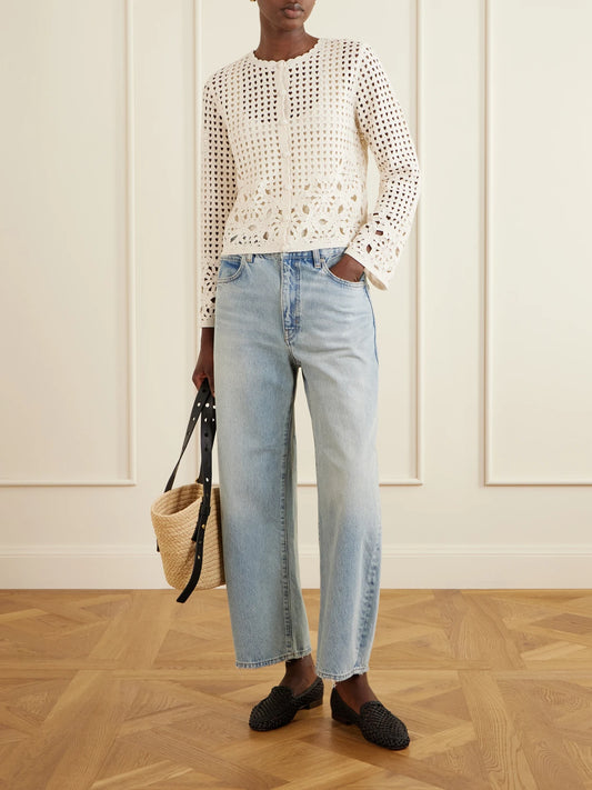 Image of a model wearing Outerwear. Product name - The Postcard Crocheted Cotton Cardigan in Cream colour by brand - FRAME