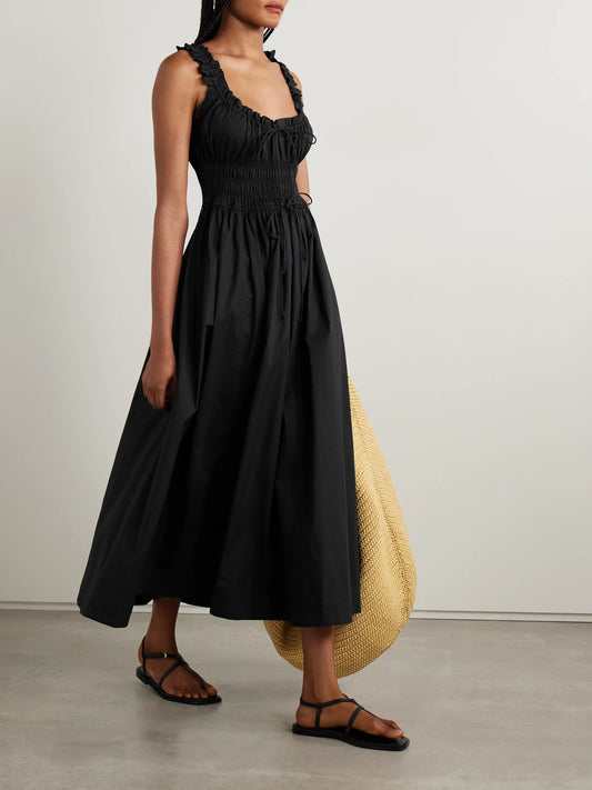 Image of Dresses. Product name - Emmaretta Tie-detailed Shirred Organic Cotton-voile Midi Dress in Black colour by brand - DÔEN