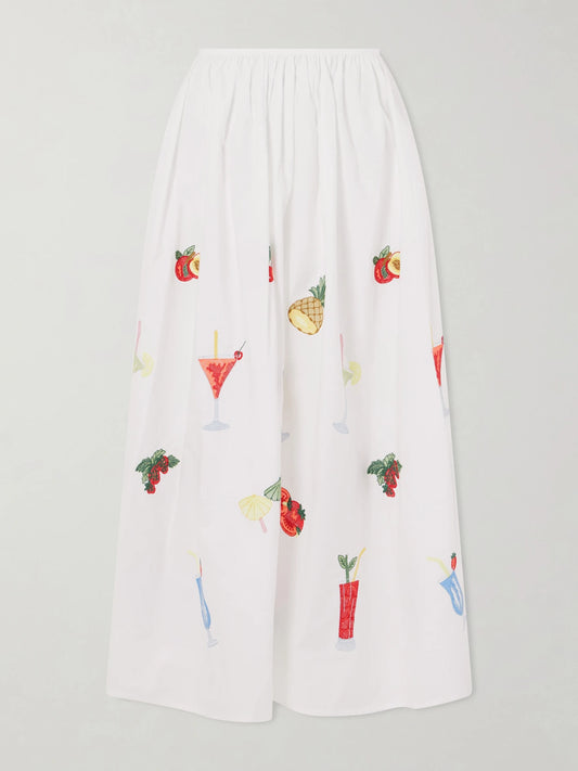 Image of a model wearing Skirts. Product name - Talamone Pleated Embroidered Cotton-poplin Maxi Skirt in Multi colour by brand - Loretta Caponi
