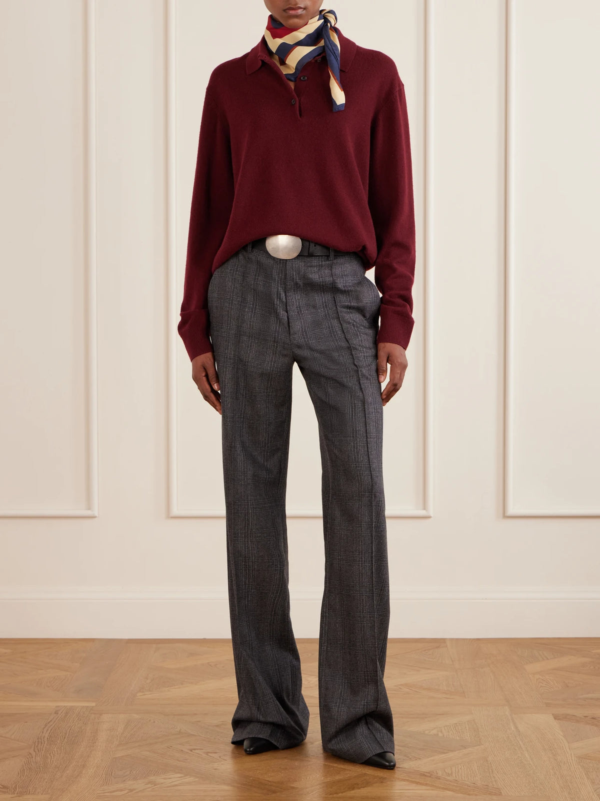 Image of a model wearing Pants. Product name - Etoile Pleated Checked Wool And Cashmere-blend Felt Straight-leg Pants in Gray colour by brand - Nili Lotan