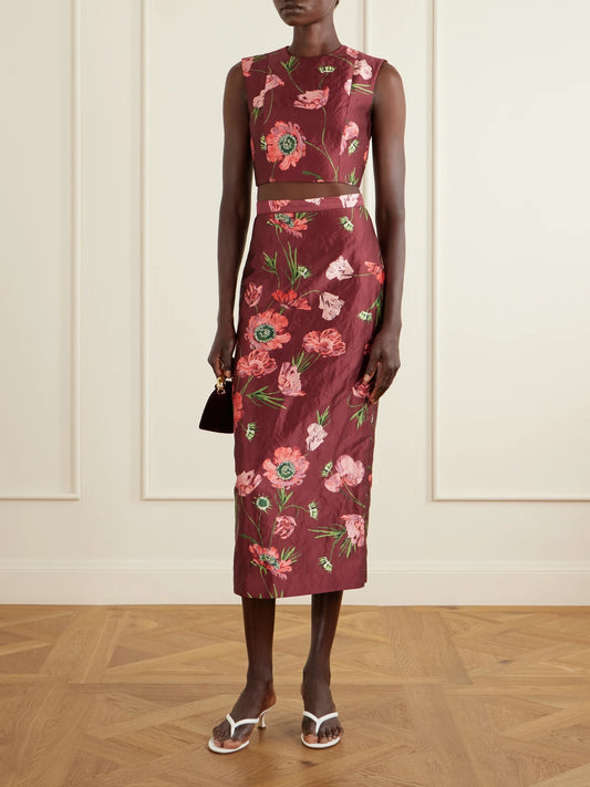 Image of a model wearing Tops. Product name - Floral-print Crinkled Satin Cropped Top in Burgundy colour by brand - Erdem
