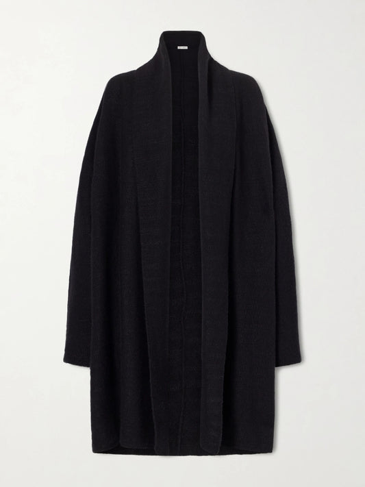 Image of a model wearing Outerwear. Product name - Novaan Cashmere And Silk-blend Cardigan in Black colour by brand - The Row