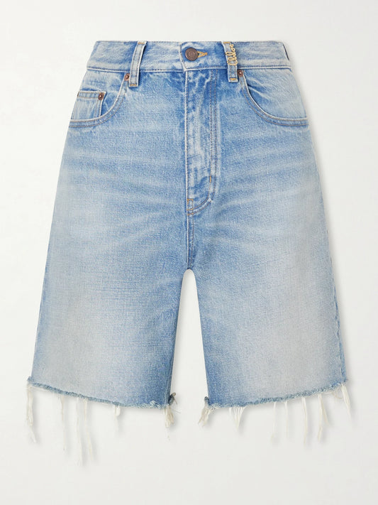Image of a model wearing Shorts. Product name - Frayed Denim Shorts in Light blue colour by brand - Chloé