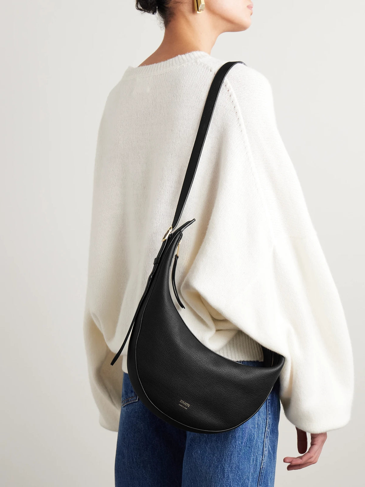 Image of Bags. Product name - Augustina Small Textured-leather Shoulder Bag in Black colour by brand - KHAITE