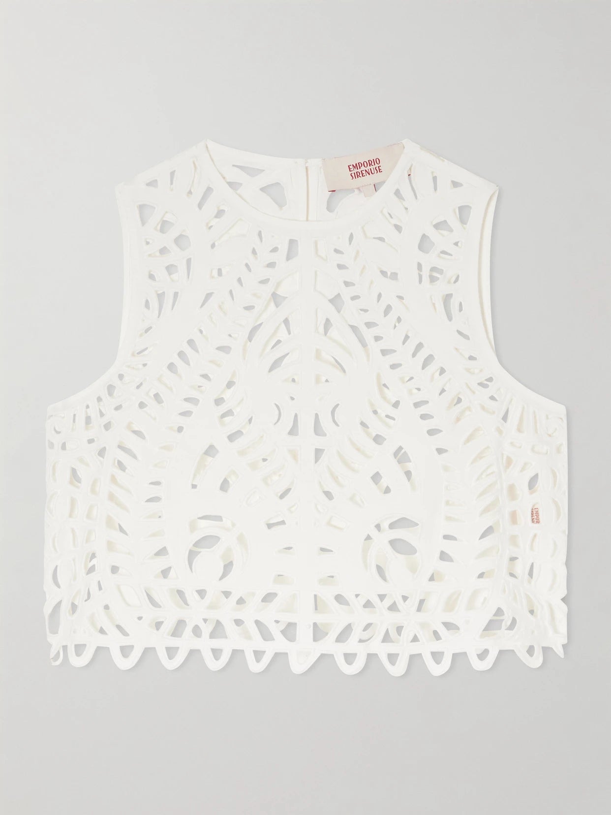 Image of a model wearing Tops. Product name - Ada Brisé Cropped Embroidered Cotton Top in White colour by brand - Emporio Sirenuse